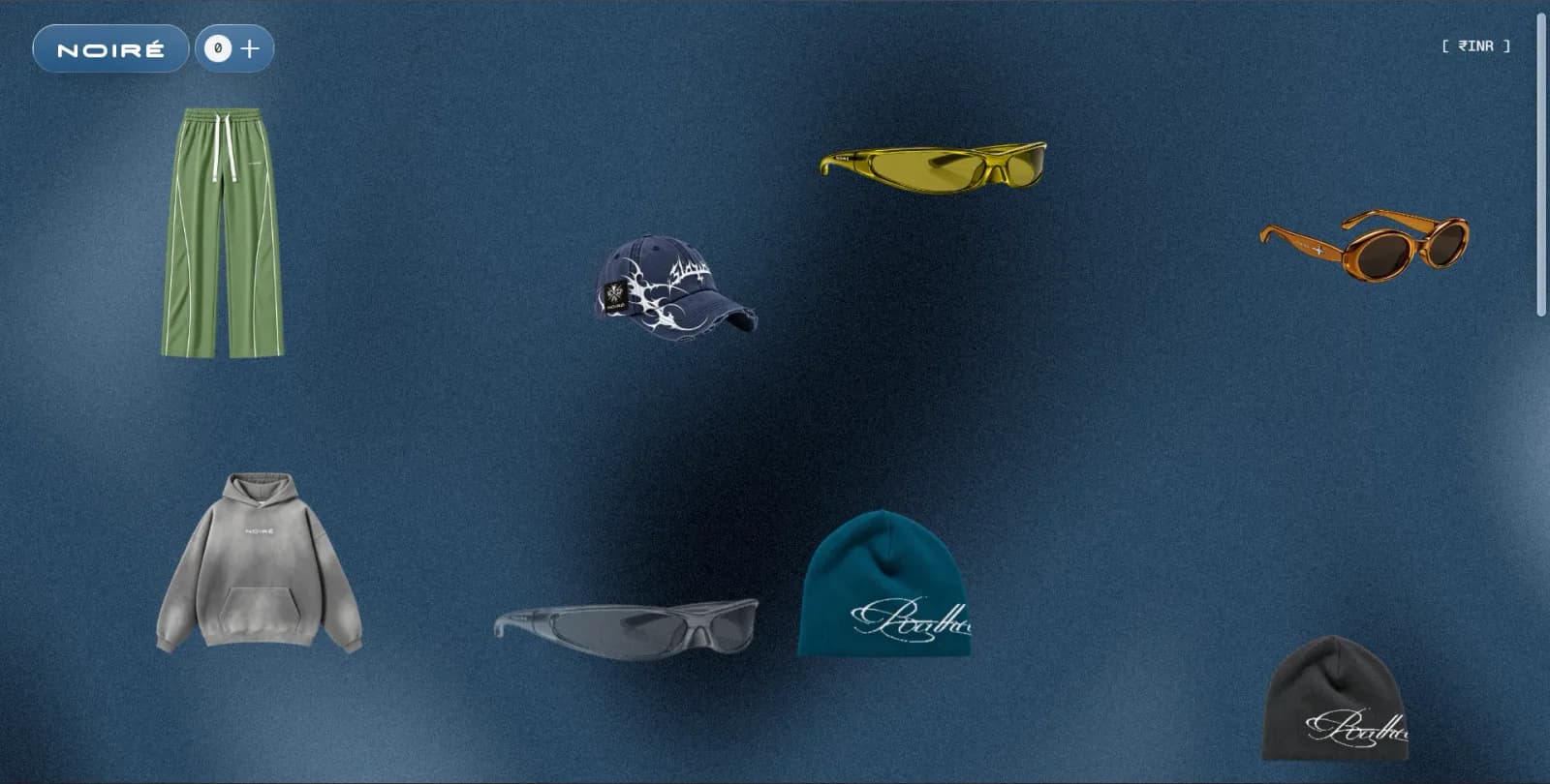 NOIRÉ store: track pants, caps, sunglasses, a hoodie and beanies floating on a grainy blue background